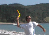 Throwing the Aussie Magic Sport Boomerang on beach